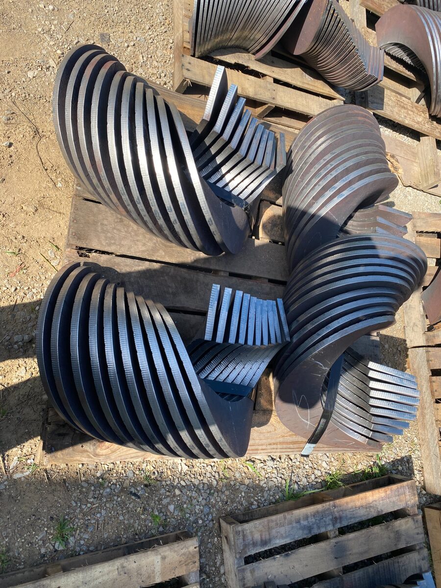 Closeup of formed auger flights on pallet